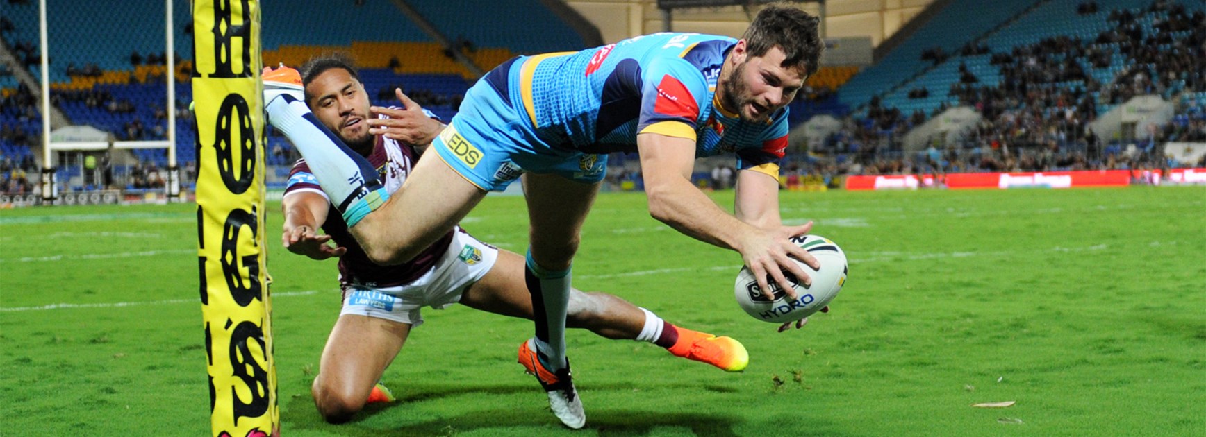 Anthony Don dives over in the corner to score against Manly on Monday night.