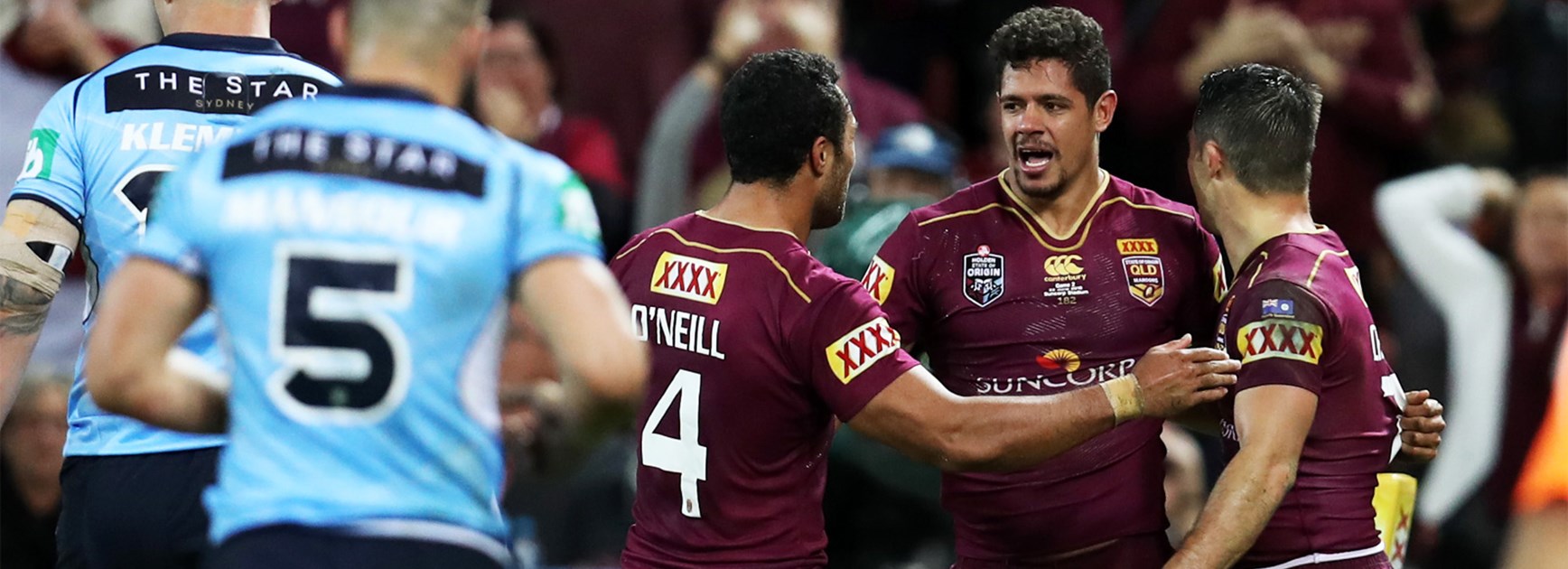 Dane Gagai and the Maroons celebrate during their State of Origin II victory.