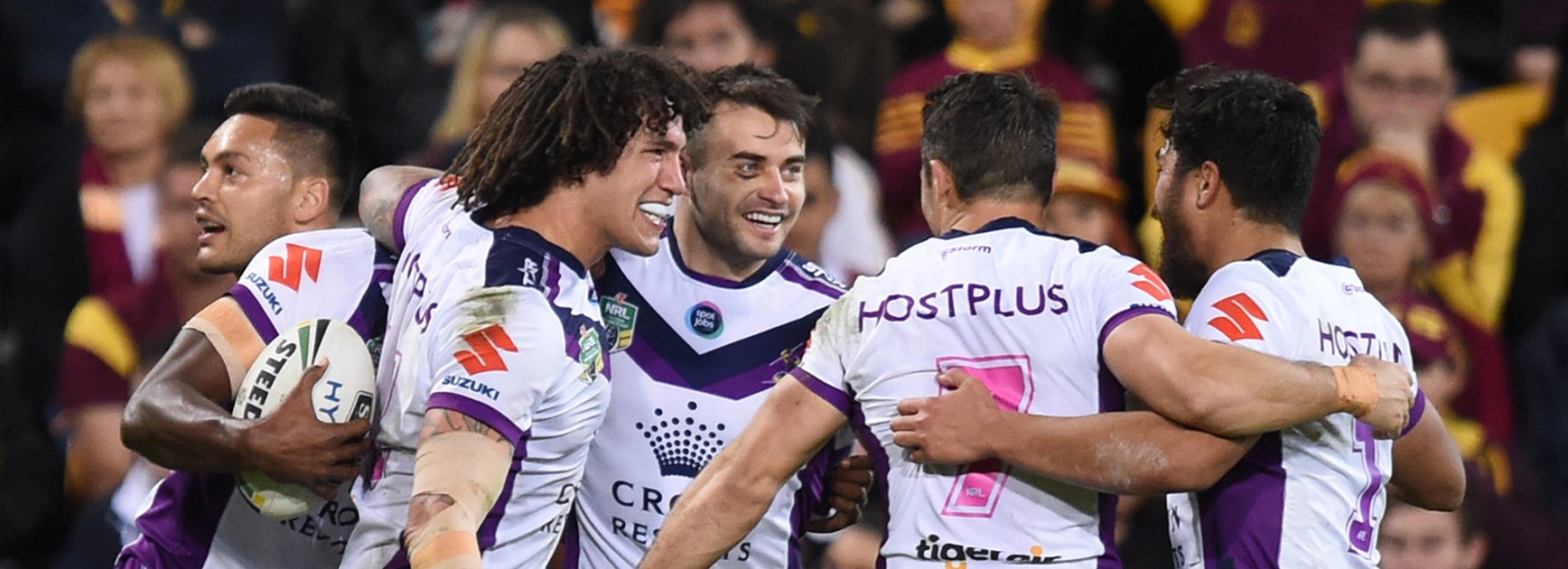 Melbourne Storm celebrate another try against the Broncos at Suncorp Stadium.