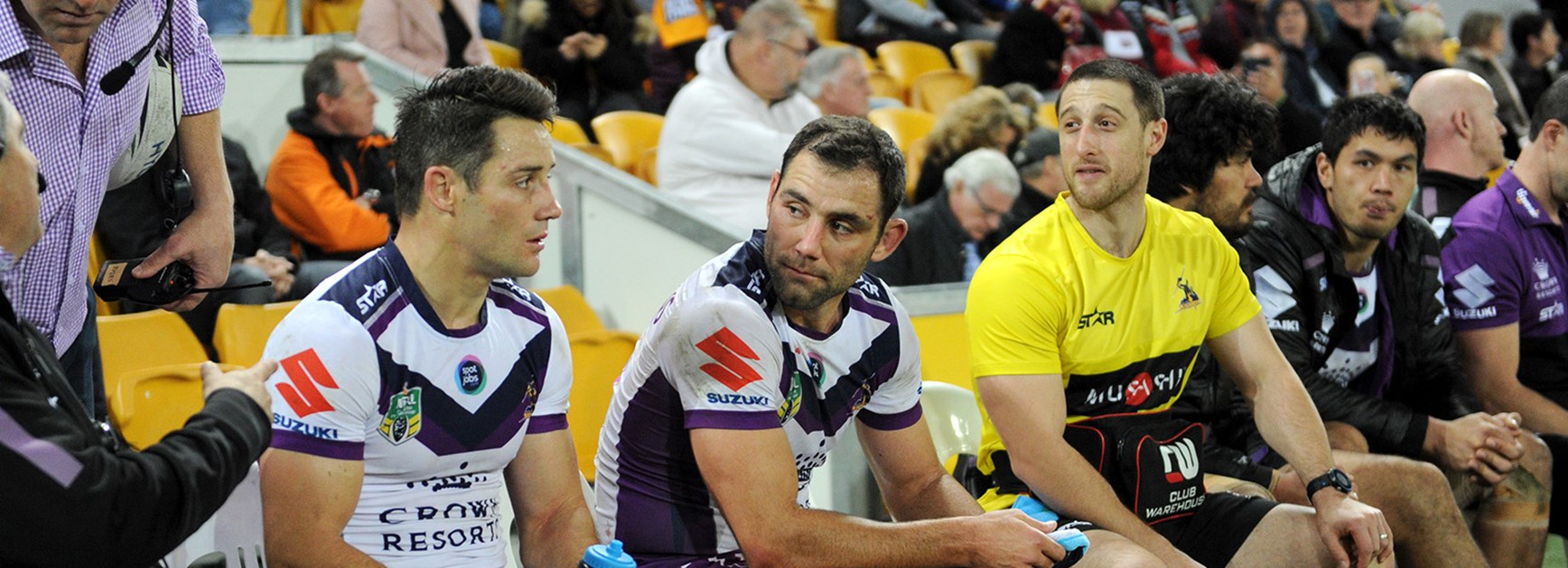 Cooper Cronk and Cam Smith are given an early rest after dismantling the Broncos at Suncorp Stadium.