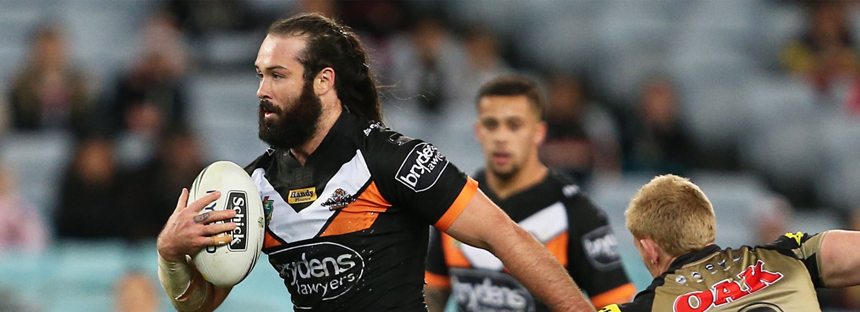 Aaron Woods makes a charge against the Panthers on Saturday night.