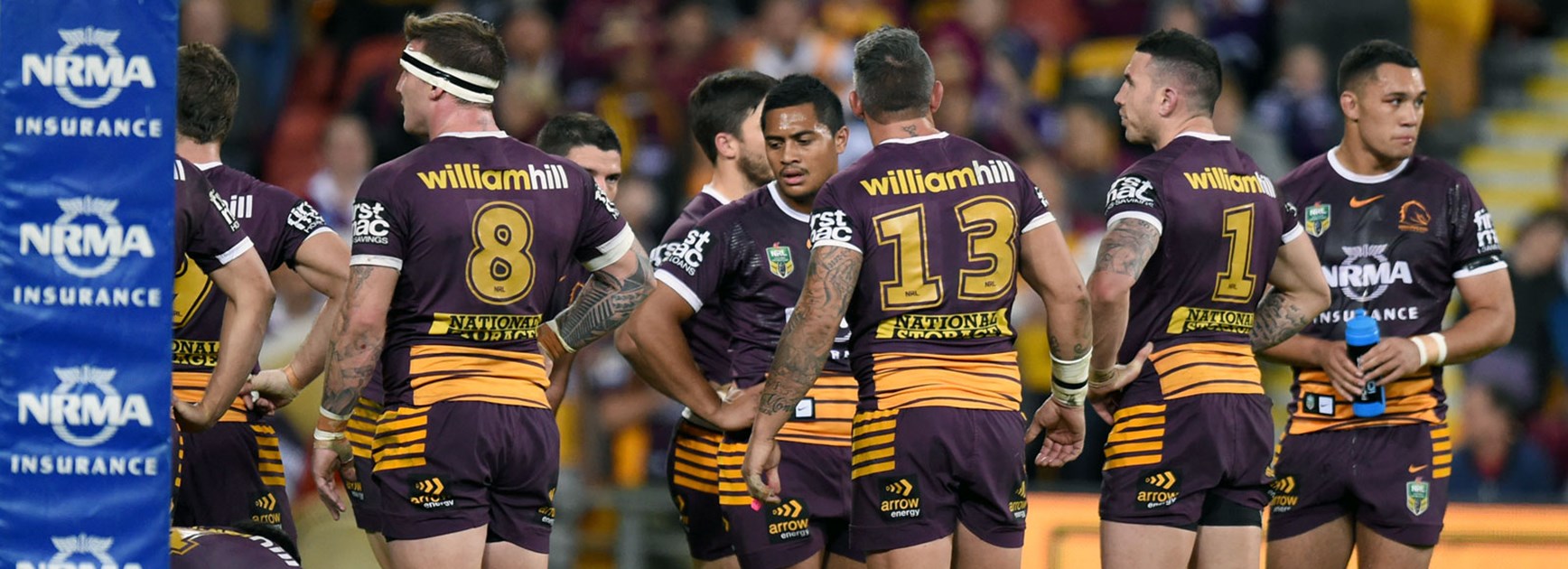 Broncos players look on during their heavy Round 17 defeat.