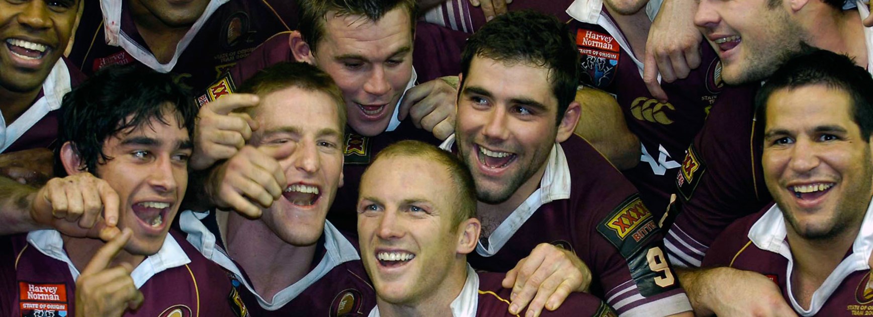 Queensland players celebrate following their series win in Game Three of the 2006 Origin series.