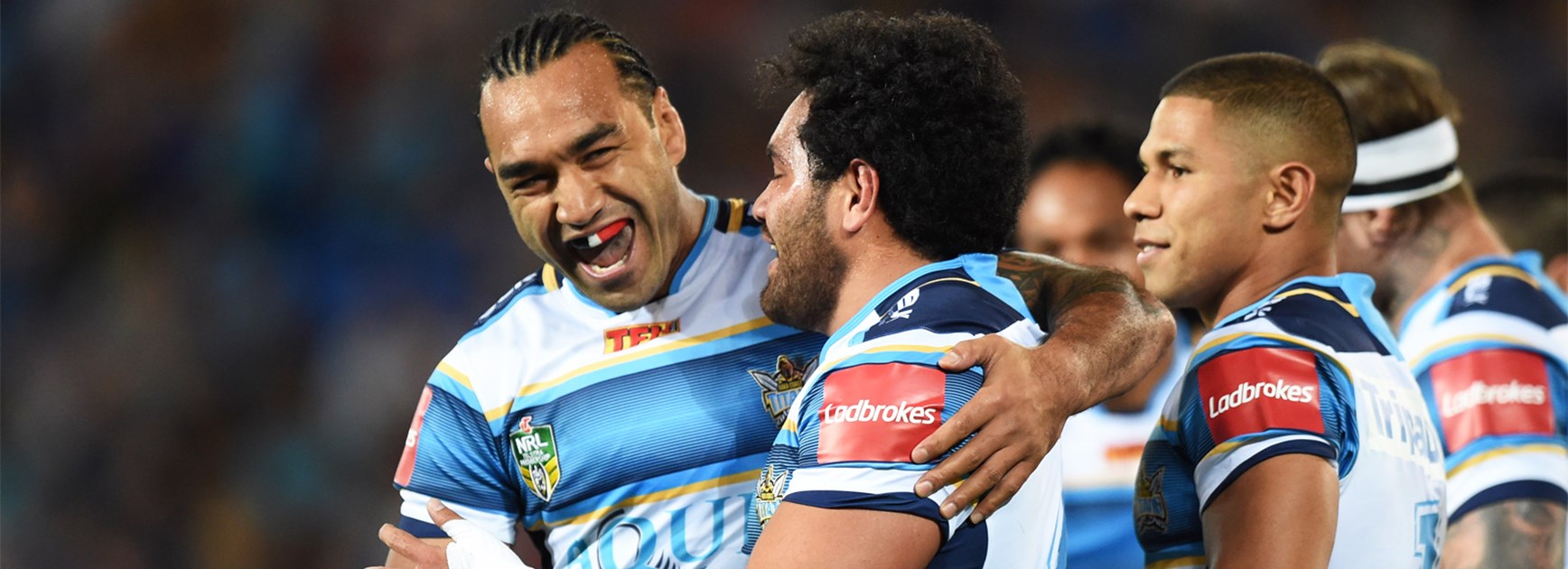 The Gold Coast Titans celebrate an early try against the Eels on Saturday.