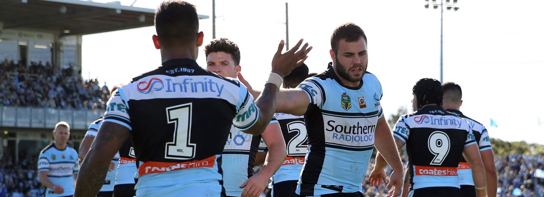 Sharks players celebrate during their Round 20 win over the Knights.