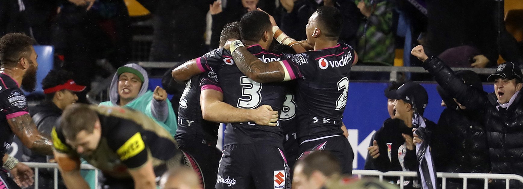 The Warriors celebrate Shaun Johnson's golden point try against the Panthers.