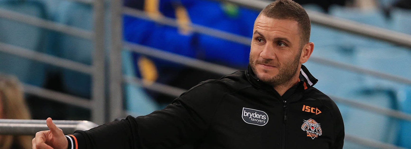 Robbie Farah watches the Round 21 clash between the Eels and the Wests Tigers.