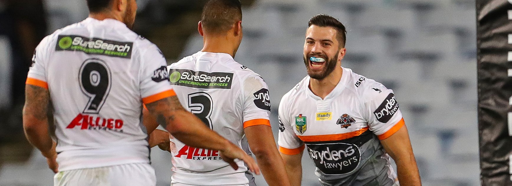 James Tedesco celebrates his try against the Eels at ANZ Stadium.