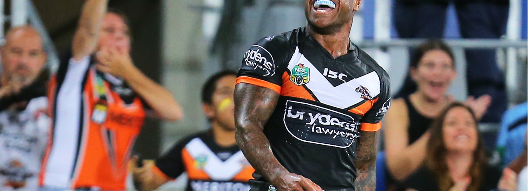 Wests Tigers speedster Kevin Naiqama celebrates a try.