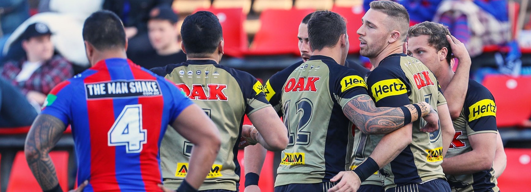 Panthers players celebrate against the Knights in Round 23.