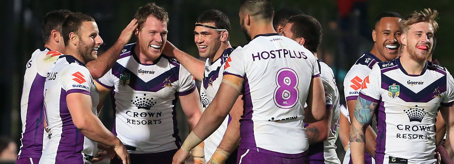 Storm players celebrate during their win over the Sea Eagles at Brookvale Oval.