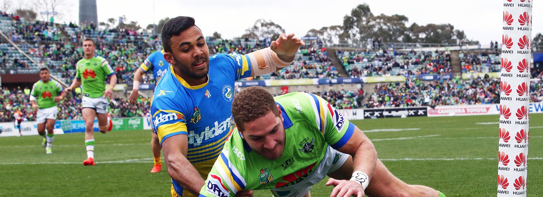 Brenko Lee scores in the corner for Canberra against the Eels on Sunday.