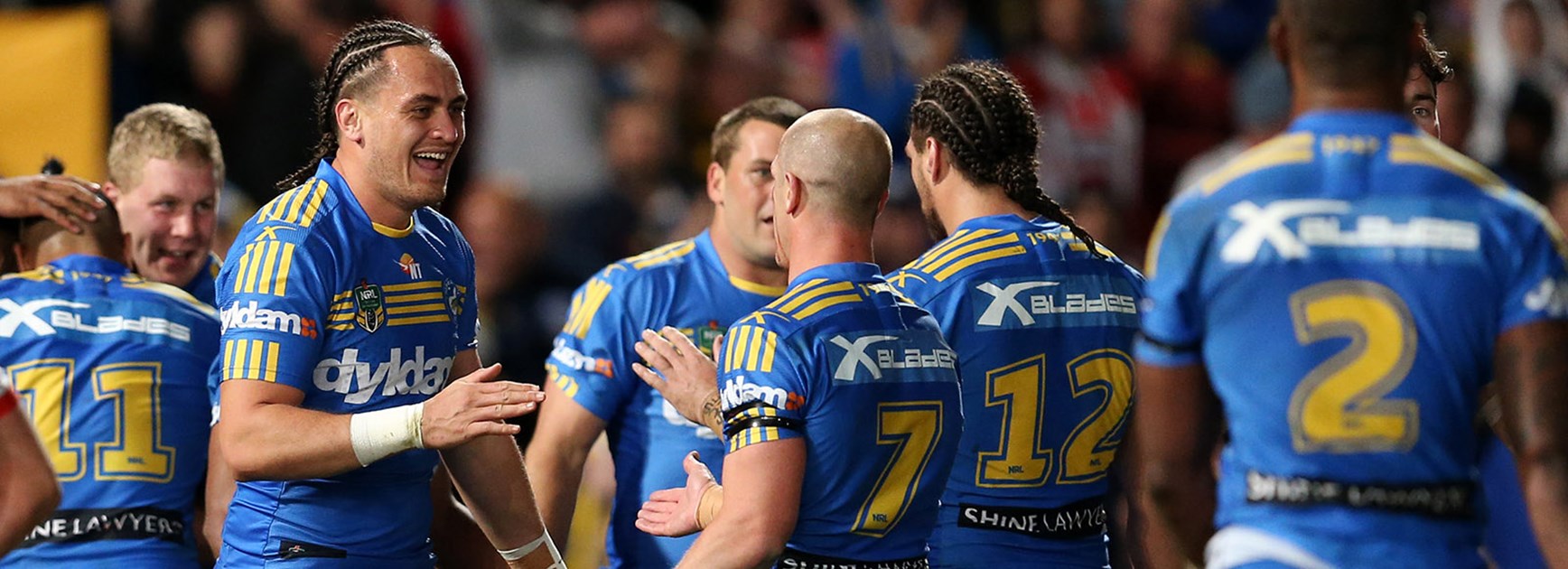 Eels players celebrate another try against the Dragons in their last ever game at Pirtek Stadium.