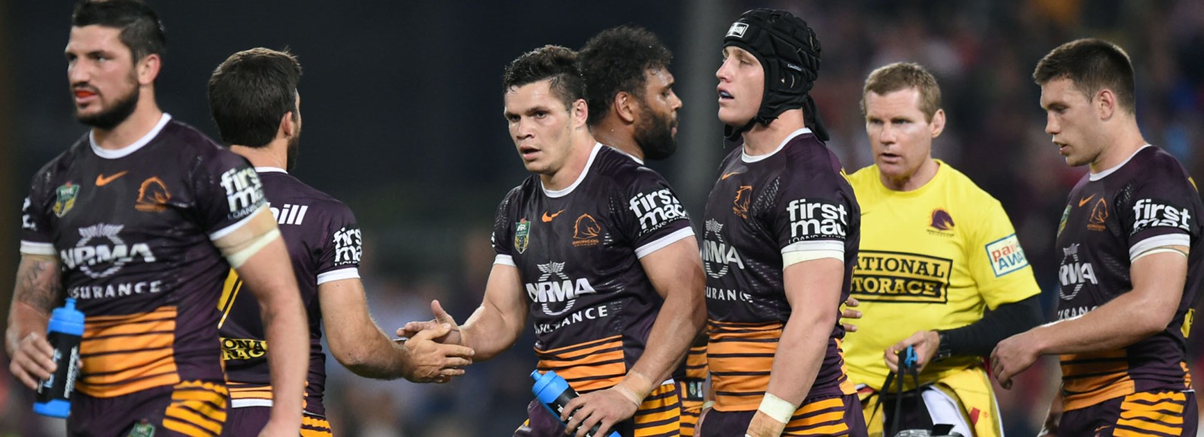 Broncos players celebrate during their win over the Roosters in Round 26.