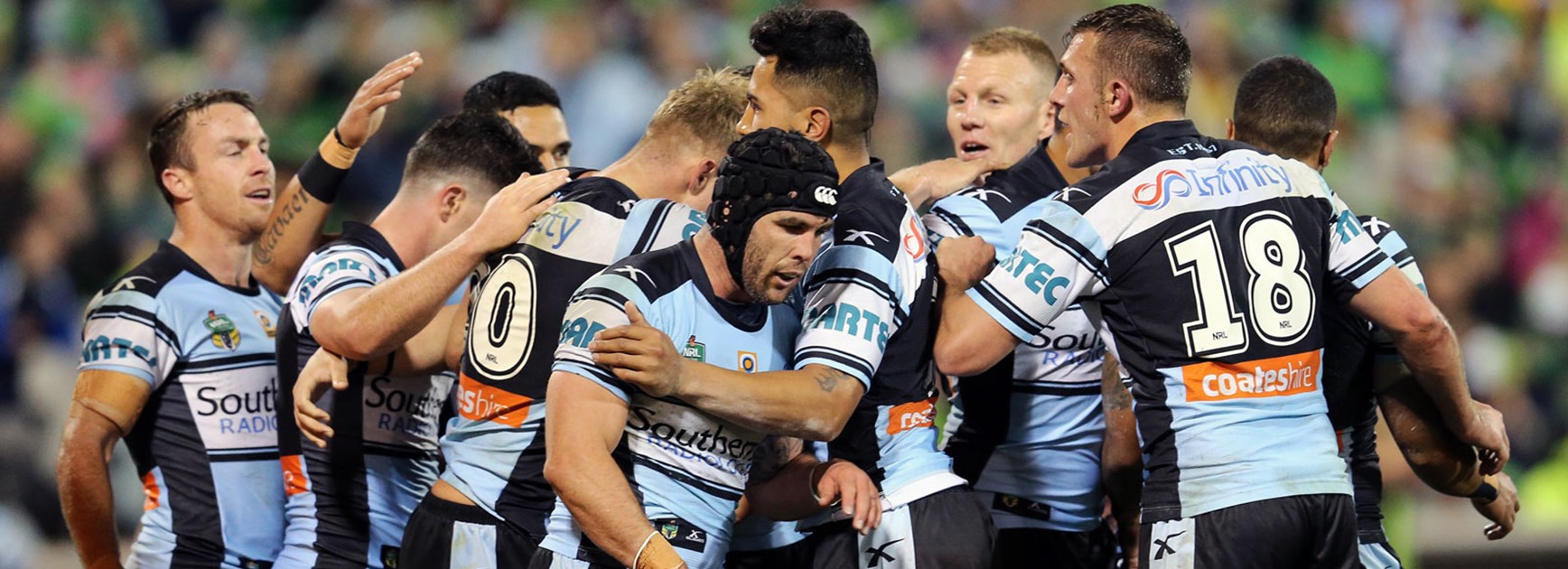 Sharks players celebrate during their qualifying final with the Raiders at GIO Stadium.