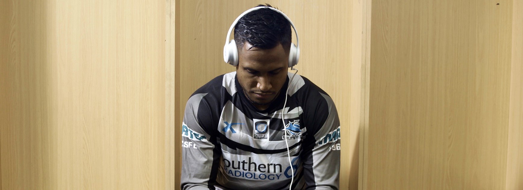 Cronulla Sharks fullback Ben Barba listening to his Apple Music playlists during the Telstra Premiership finals.