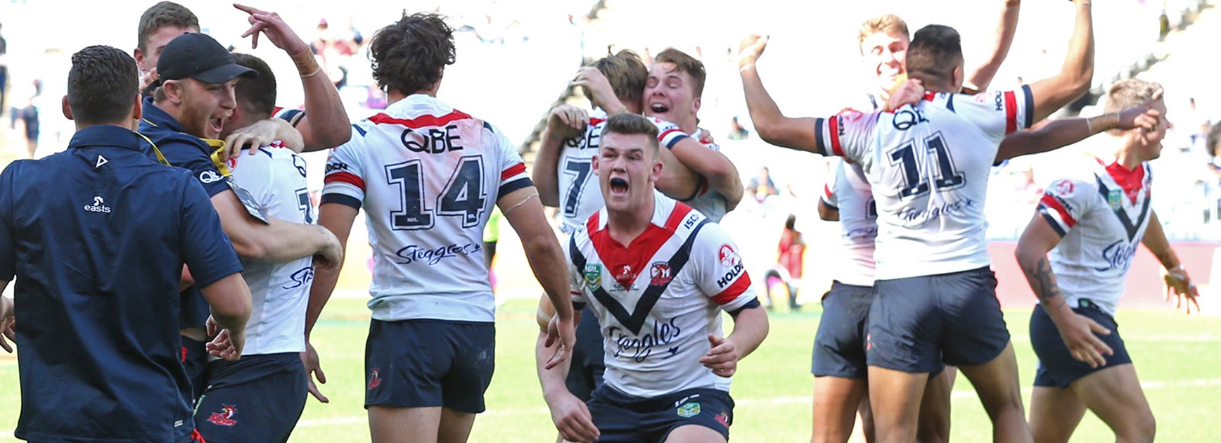 Roosters celebrate their dramatic Holden Cup comeback win.