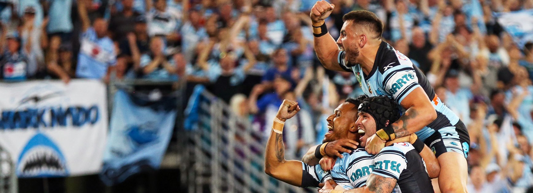 Sharks players celebrate Ben Barba's first-half try in their 2016 NRL grand final win.