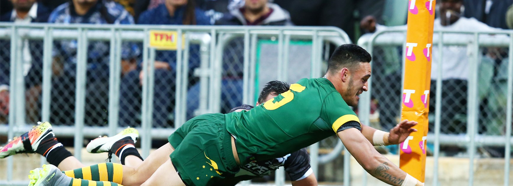 Valentine Holmes scores on his Test debut against New Zealand in Perth.