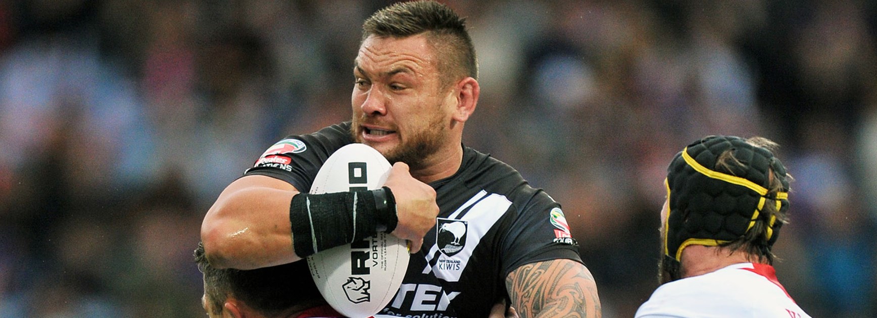 Kiwis prop Jared Waerea-Hargreaves contained by the England defence.