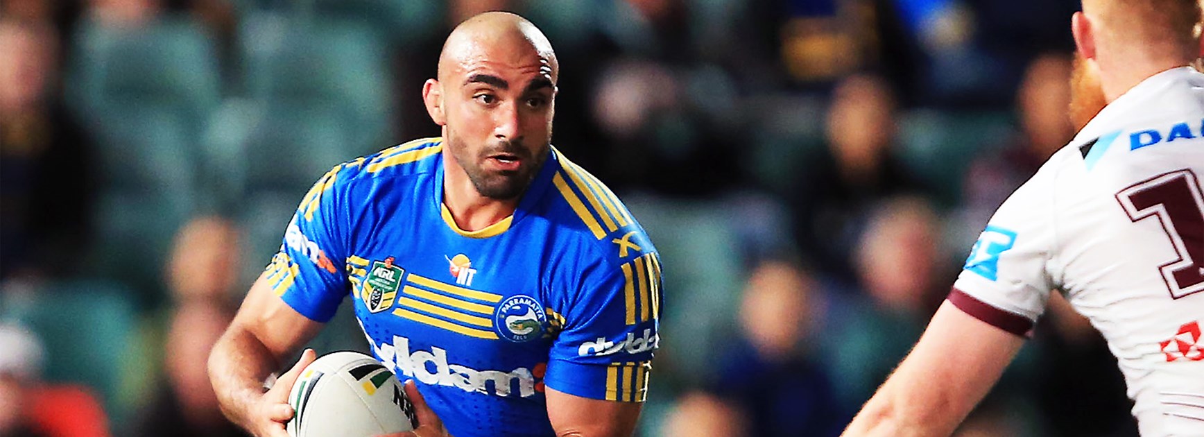 Tim Mannah takes a hit-up against Manly in Round 22.