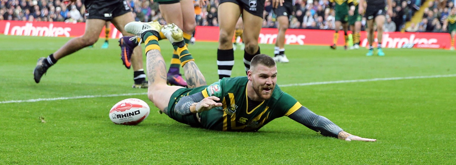 Kangaroos centre Josh Dugan crosses for a try in the Four Nations final.