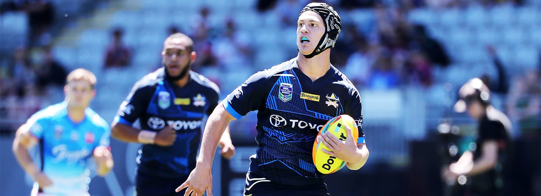 Kalyn Ponga runs clear to score an intercept try against the Roosters at the Auckland Nines.