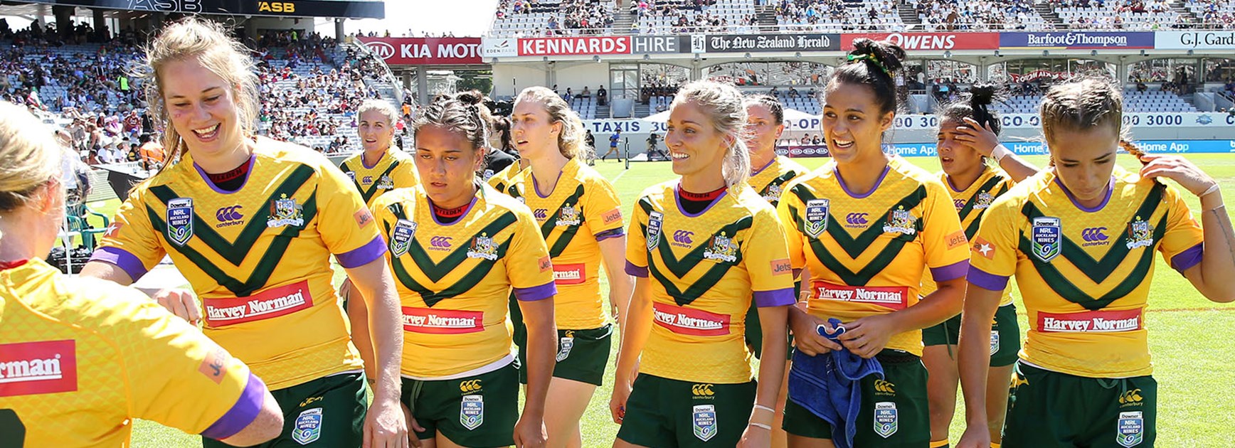Kezie Apps and the Jillaroos celebrate their win against the Kiwi Ferns in the first game.