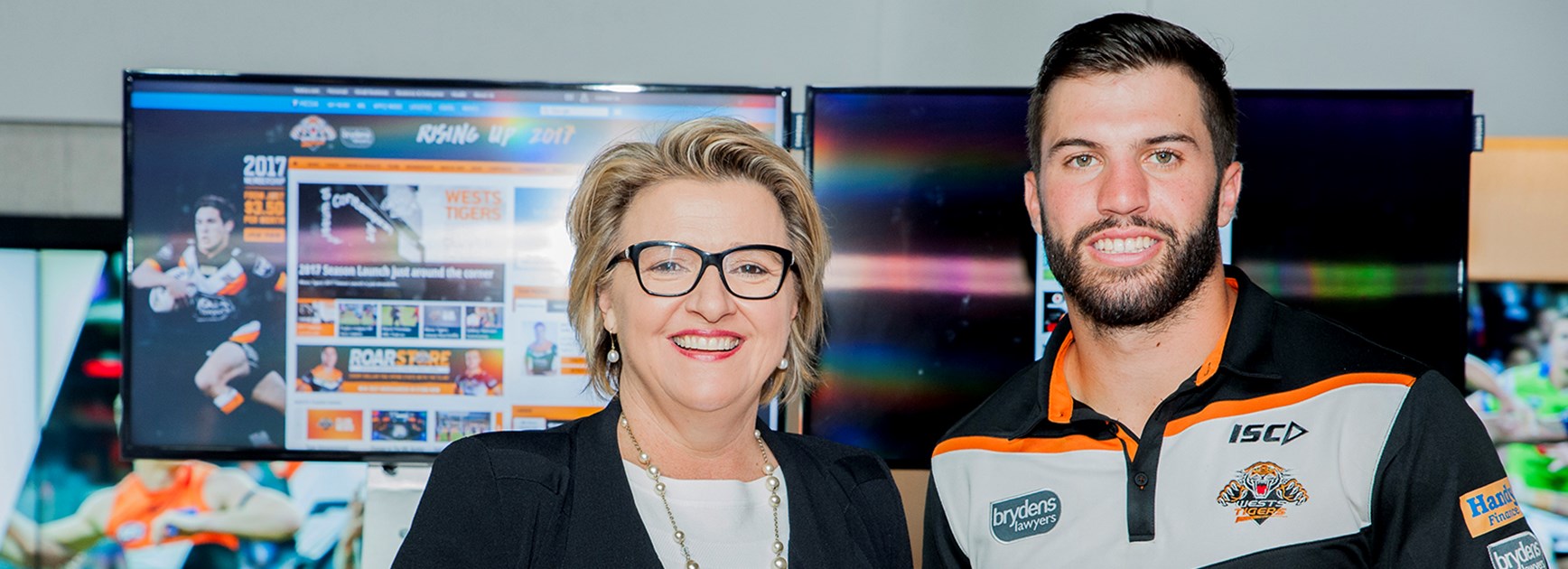 Michele Garra, Executive Director Telstra Media, with Wests Tigers fullback James Tedesco at the Telstra sports app launch.