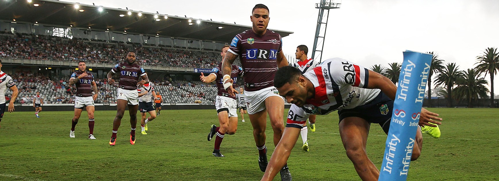 Daniel Tupou scores for the Roosters in their trial against Manly.