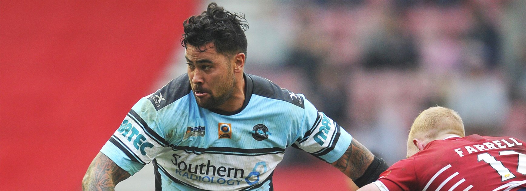 Andrew Fifita makes a charge during the World Club Challenge.