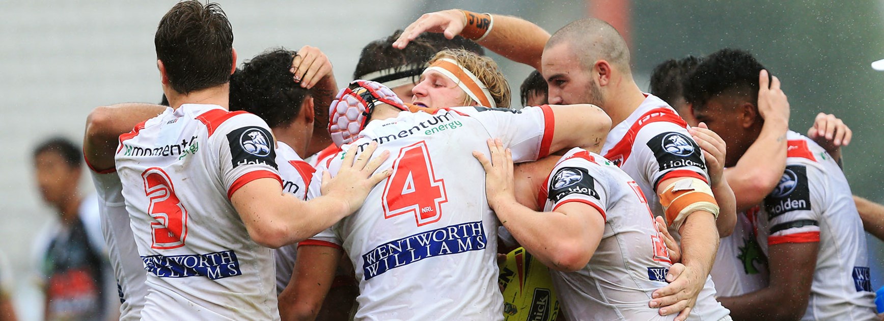Dragons NYC players celebrate their Round 1 victory over the Panthers.