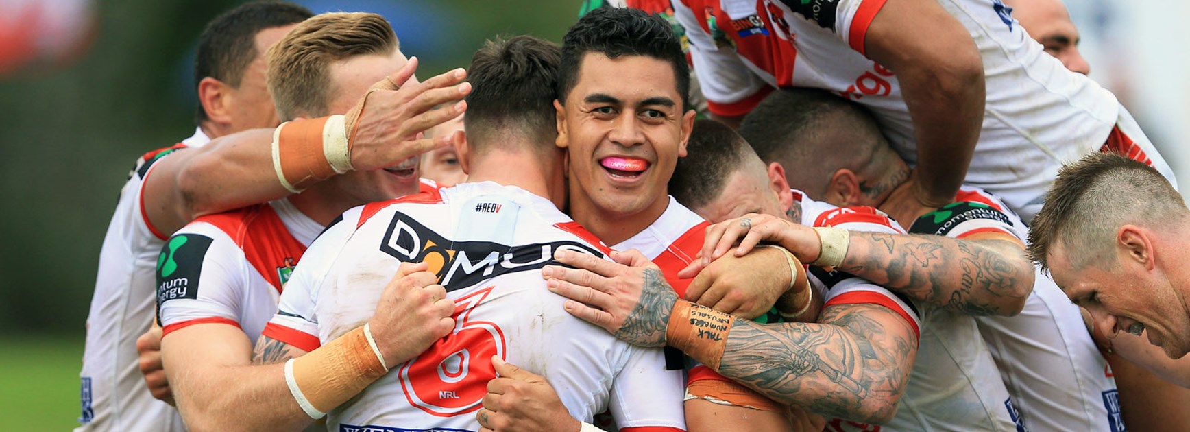 Dragons players celebrate during their win over the Panthers.