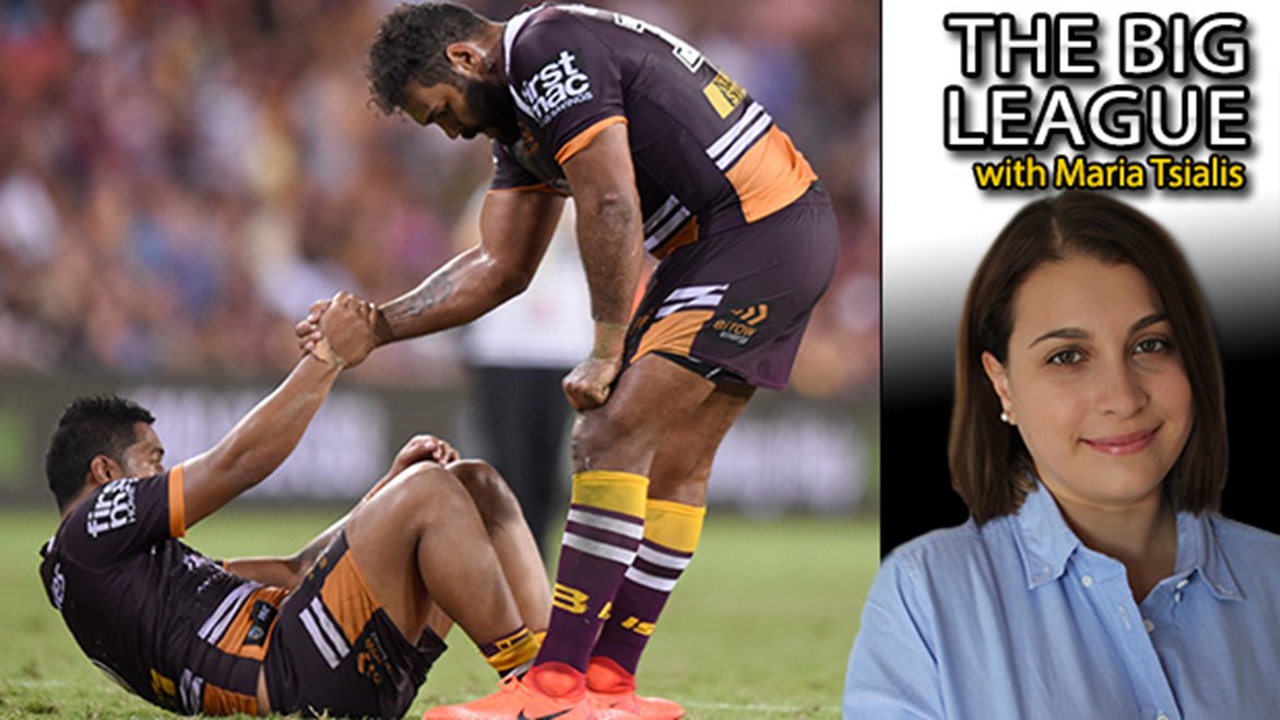 Sam Thaiday helps Anthony Milford to his feet after a golden point loss to the Cowboys.