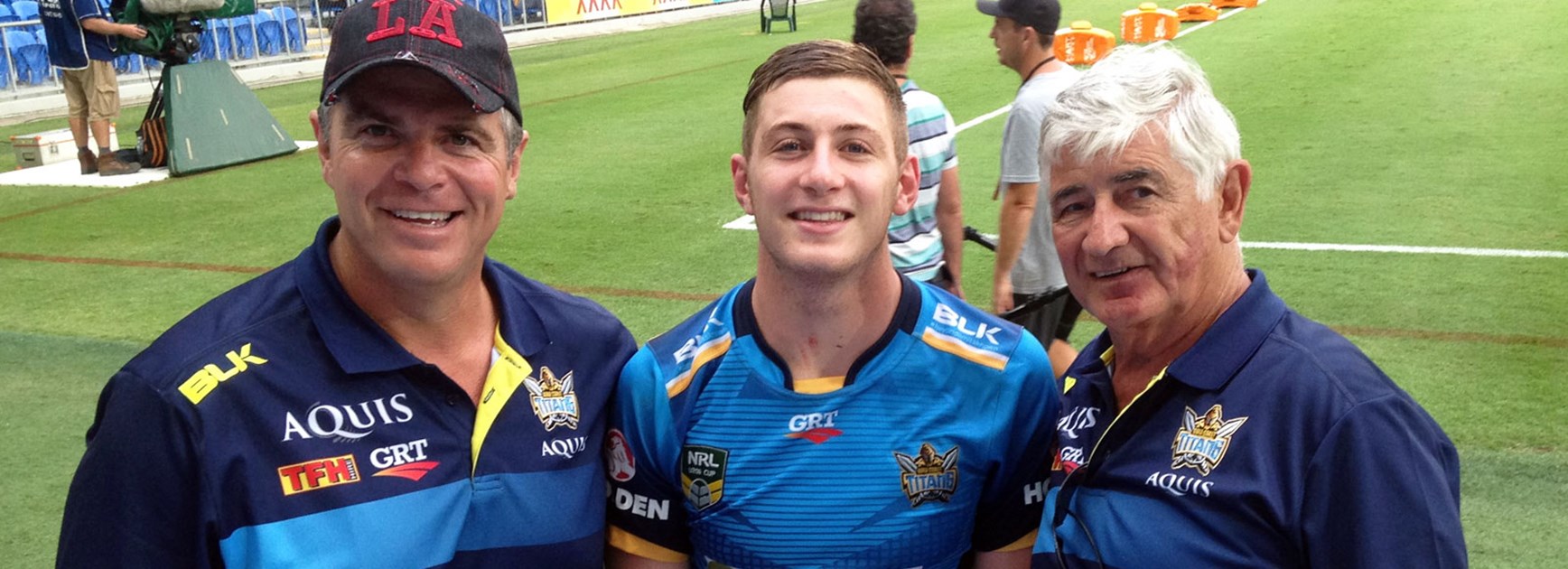 Titans rookie Max King with father David (left) and grandfather Johnny (right) following his NRL debut.