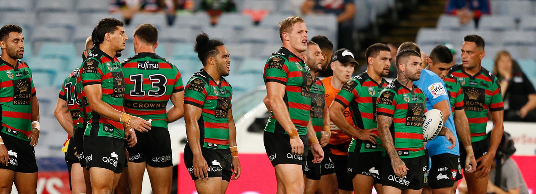 The Rabbitohs watch on after another Roosters try in Round 4.