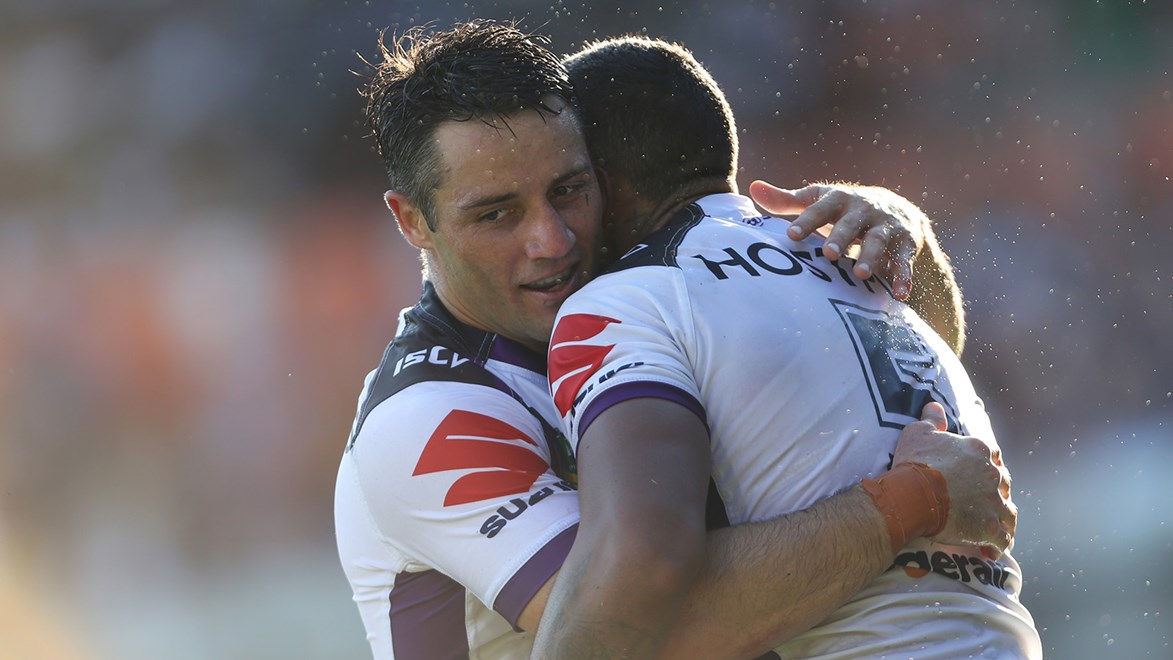 Cooper Cronk celebrates after a comeback win over the Wests Tigers.
