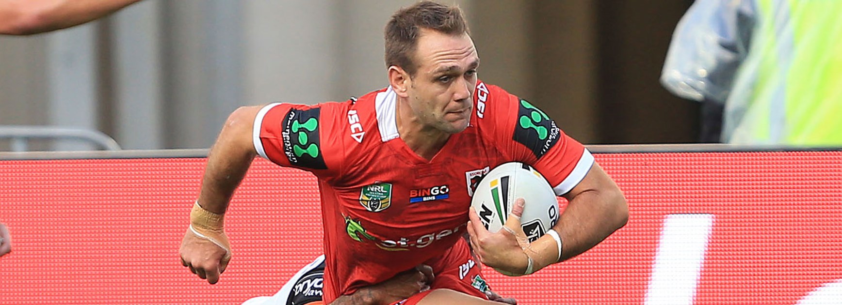 Dragons winger Jason Nightingale crossed for three tries in the first half of his side's clash with Wests Tigers.