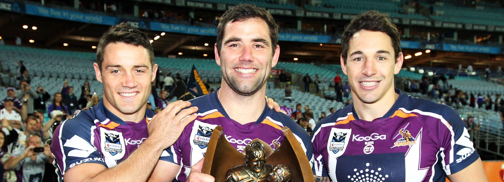 Cooper Cronk, Cameron Smith and Billy Slater after Melbourne's grand final win in 2012.