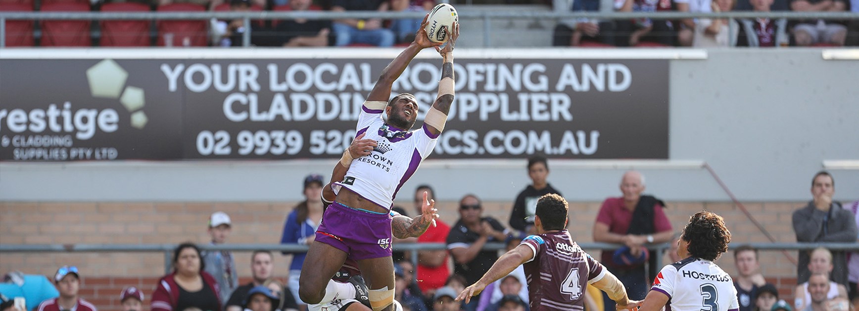 Suliasi Vunivalu flies above the pack to score a spectacular try for Melbourne against Manly in Round 7.
