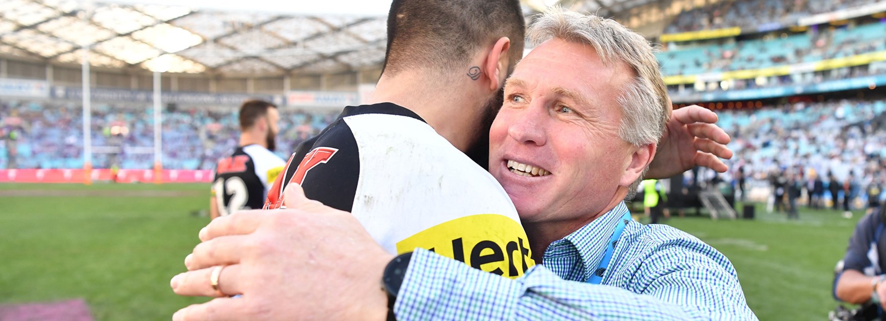 Garth Brennan celebrates the Penrith Panthers' Intrust Super State Championship win on Grand Final Day.