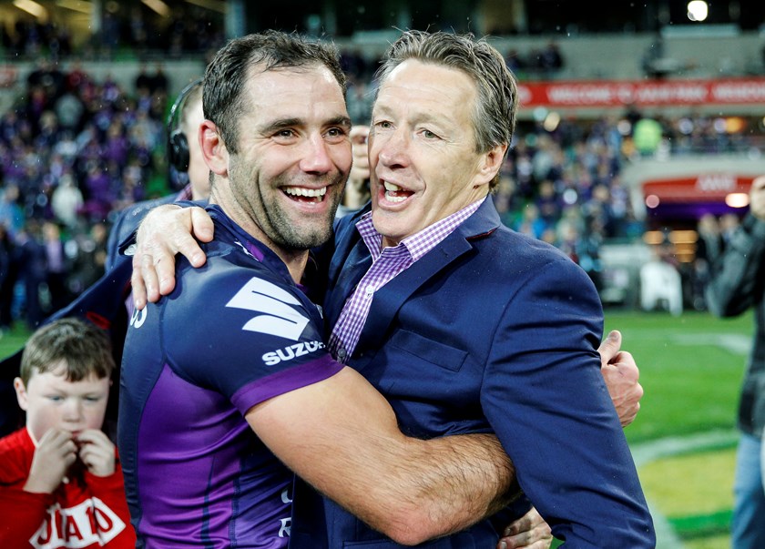 Cameron Smith and Craig Bellamy celebrate after winning the 2017 grand final.