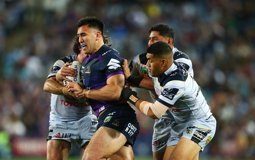 Melbourne Storm prop Nelson Asofa-Solomona carries the ball.