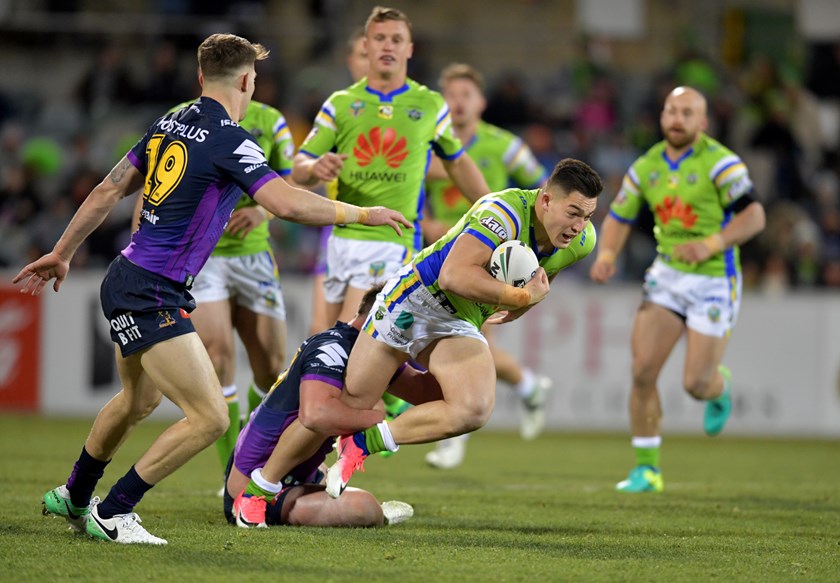 Raiders winger Nick Cotric takes on the Melbourne Storm defence.