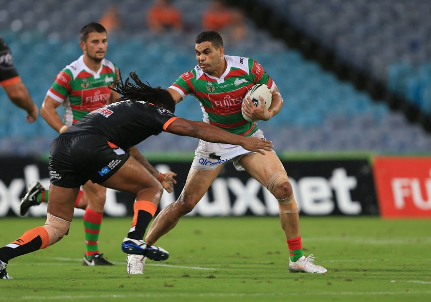 Greg Inglis takes on the Wests Tigers defence in round one of 2017.