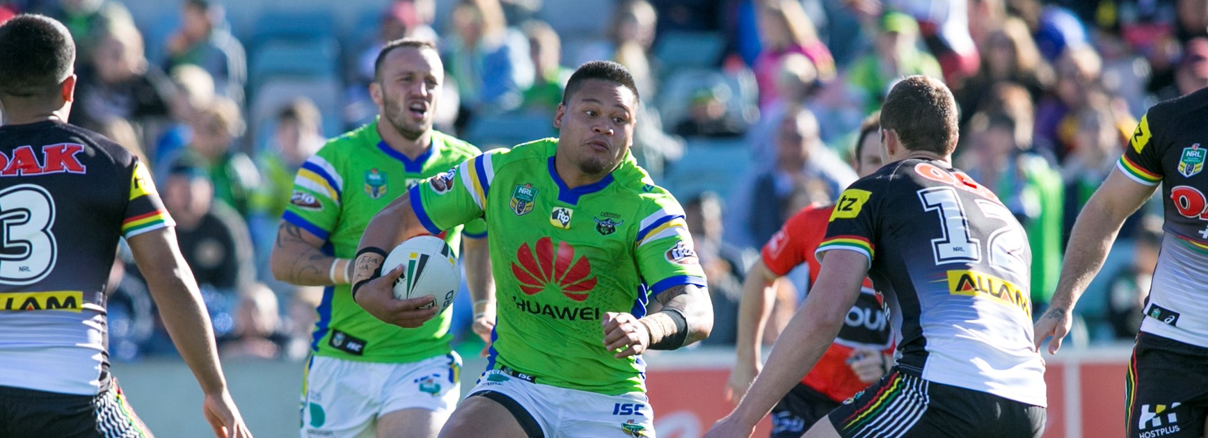 Canberra Raiders centre Joey Leilua takes on the Panthers defence.