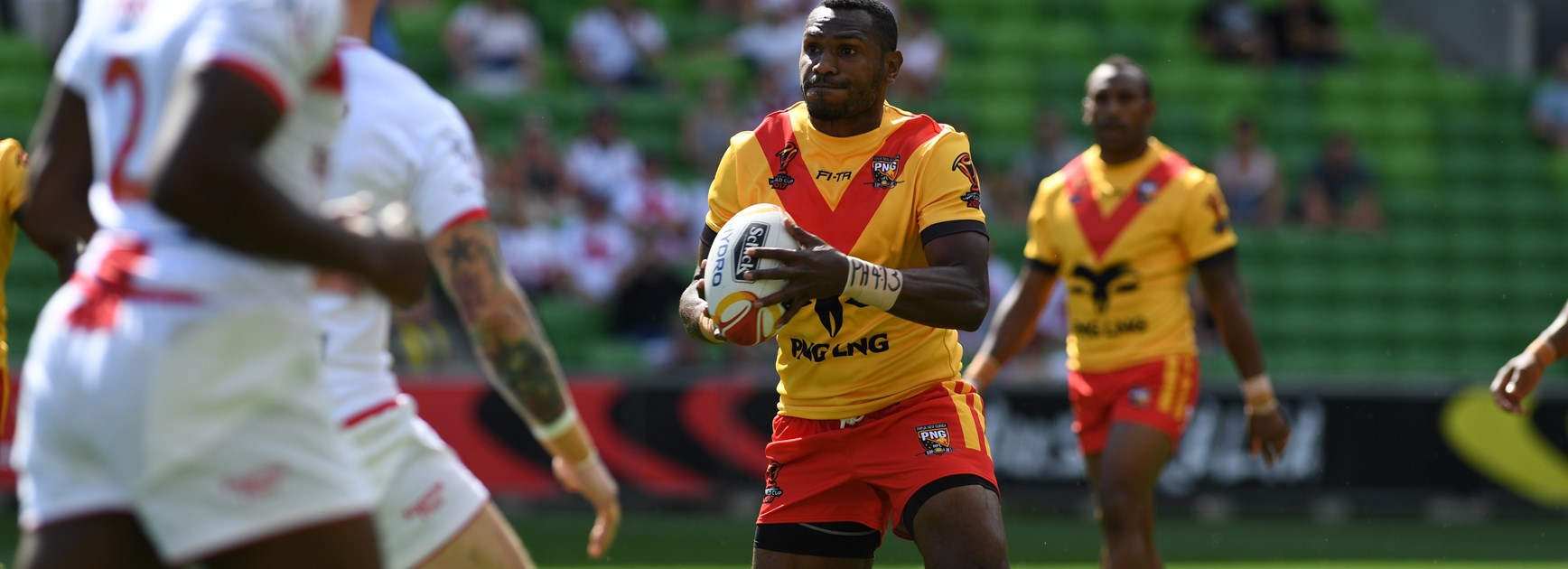 Kato Ottio in action for Papua New Guinea against England at the Rugby League World Cup.
