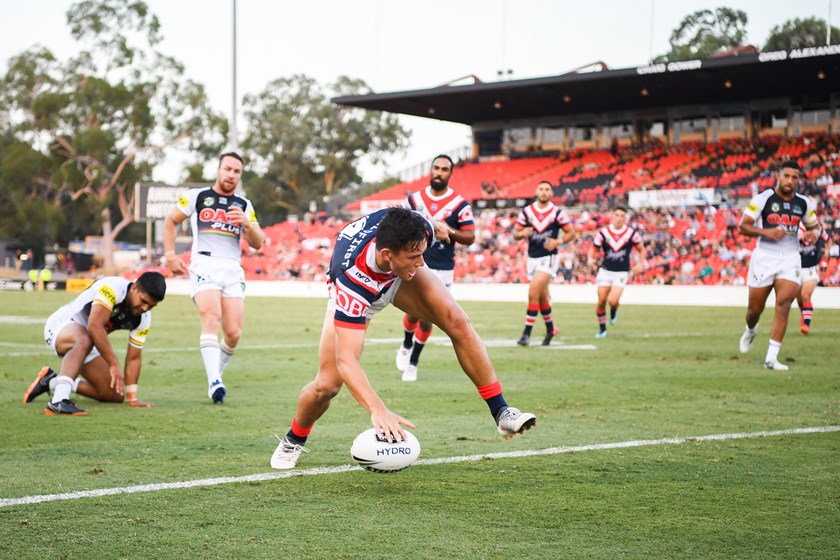 Joseph Manu scores for the Roosters.