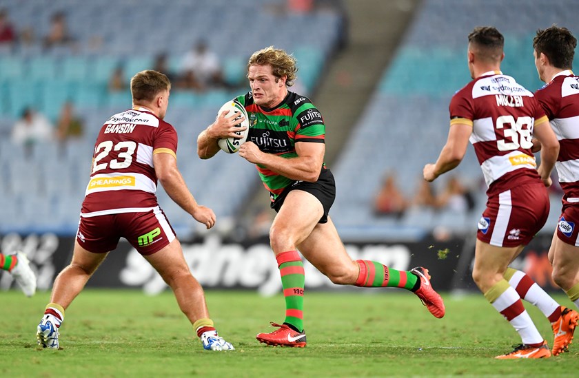 Rabbitohs prop George Burgess takes a charge against Wigan.