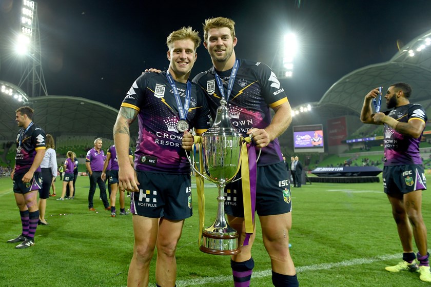 Cameron Munster and Christian Welch holding the World Club Champions trophy. 